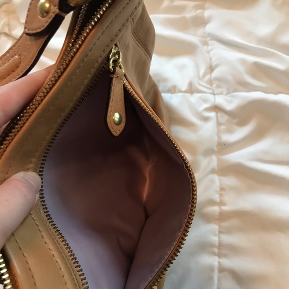 Coach handbag, lightly used, now eat or tear. Light brown with gold accents. - Picture 3 of 5